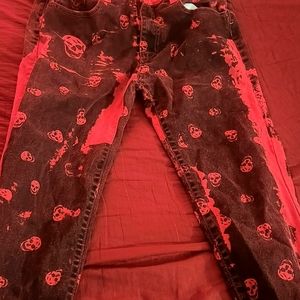 Red skull skinny jeans